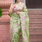 Embroidered cutwork tissue silk saree - Green