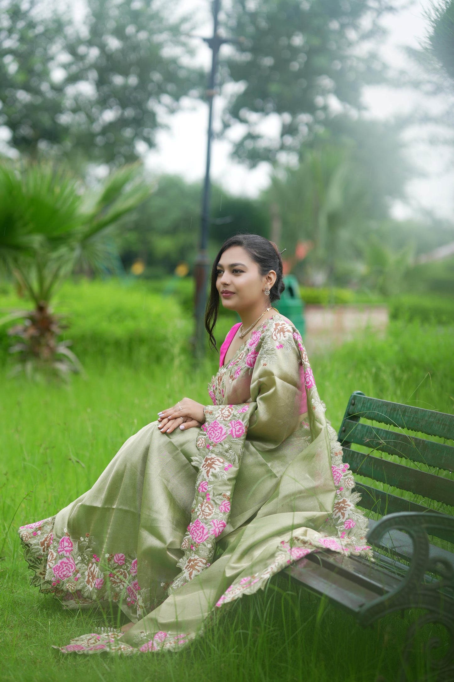 Embroidered cutwork tissue silk saree - Green