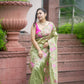 Embroidered cutwork tissue silk saree - Green