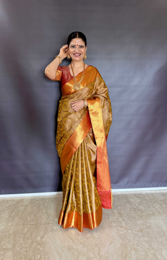 Nita-Inspired Tissue Silk Saree – Gold with Copper Border - AbirabyBeena