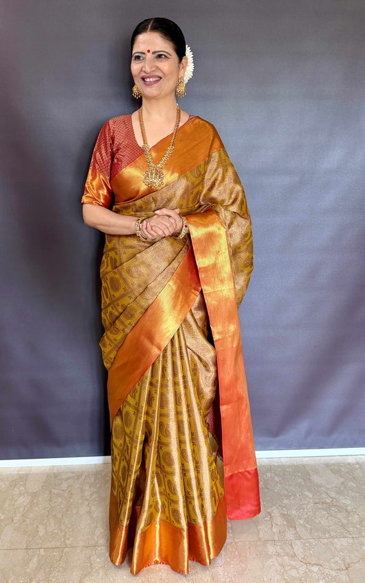 Nita-Inspired Tissue Silk Saree – Gold with Copper Border - AbirabyBeena